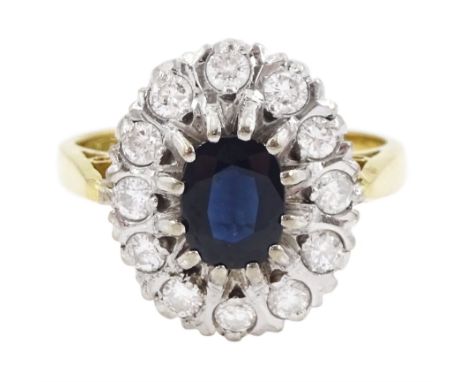 18ct gold oval cut sapphire and round brilliant cut diamond cluster ring, London 1976, sapphire approx 0.70 carat, total diam