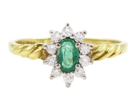 18ct gold oval cut emerald and round brilliant cut diamond ring, Birmingham 1991, emerald approx 0.20 carat, total diamond we