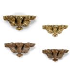 A PAIR OF FOLIATE CARVED GILTWOOD WALL BRACKETS, 20TH CENTURY