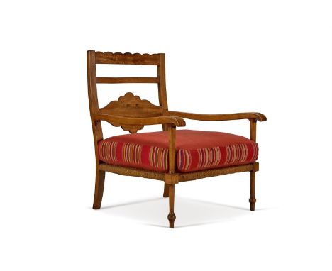 A WALNUT OPEN ARMCHAIR OF LARGE SIZE  PROBABLY NORTH EUROPEAN, MID 20TH CENTURY With red striped cotton cushion above a woven