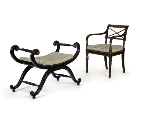 A REGENCY LATER BLACK PAINTED OPEN ARMCHAIR EARLY 19TH CENTURY  With an X-splat, squab cushion and caned seat  81cm highToget