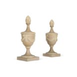 A PAIR OF GREY AND CREAM PAINTED CARVED WOOD FLAMING URNS, NORTH EUROPEAN