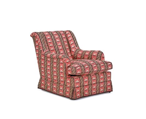 A 'ST JAMES' EASY ARMCHAIR BY SIBYL COLEFAX & JOHN FOWLER  Upholstered in Sibyl Colefax & John Fowler 'Strawberry Leaf' cotto