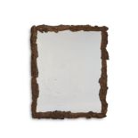A CORK FRAMED MIRROR, MODERN
