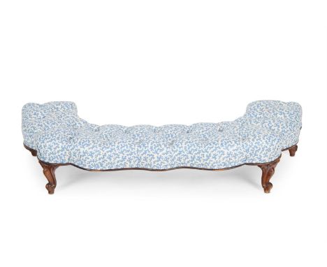 A BLUE AND WHITE BUTTON UPHOLSTERED CURVED FIRESIDE FOOTSTOOL  19TH CENTURY Later reupholstered in Sibyl Colefax & John Fowle