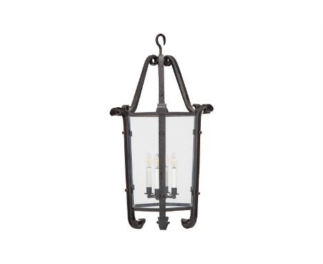 A PATINATED WROUGHT IRON HEXANGONAL LANTERN POSSIBLY SPANISH, MID 20TH CENTURY Fitted for electricity 97cm high, 54cm diamete