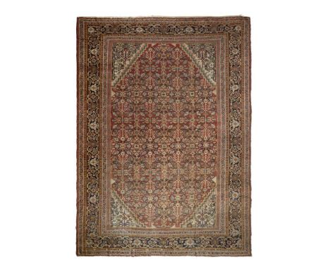 A PERSIAN CARPET PROBABLY TABRIZ Approximately 414 x 304cm   Condition Report:  Carpet with wear overall consistent with age 
