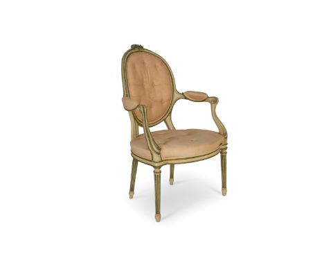 A GEORGE III LATER CREAM AND GREEN-PAINTED OPEN ARMCHAIR  IN THE MANNER OF INCE & MAYHEW, LATE 18TH CENTURY The oval padded b