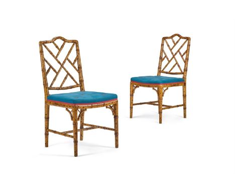 A PAIR OF PAINTED SIMULATED BAMBOO SIDE CHAIRS ENGLISH, LATE 20TH CENTURY Each with blue cotton and tufted button upholstered