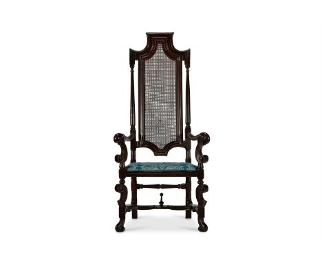 A PAINTED BEECH OPEN ARMCHAIR ENGLISH, LATE 17TH CENTURY AND LATER With a caned back and seat and upholstered cushion 142cm h