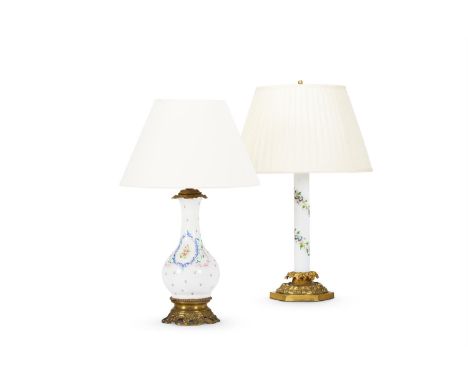 A BRASS MOUNTED AND OPALINE GLASS COLUMN LAMP  FRENCH, SECOND HALF 19TH CENTURY Painted with twisting floral decoration 70cm 