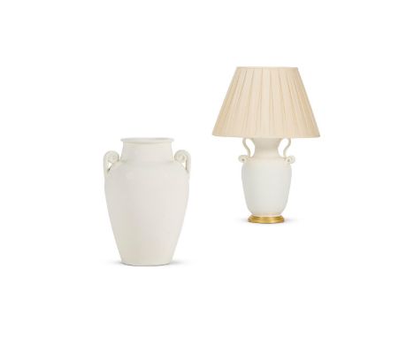 A WHITE GLAZED POTTERY LAMP OF AMPHORA SHAPE  MODERN With scrolling handles  57cm high overallTogether with a white glazed po