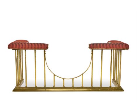 A BRASS CLUB FENDER ENGLISH, EARLY 20TH CENTURY  Upholstered in striped horsehair  61cm high, 150cm wide, 65cm deep    Condit