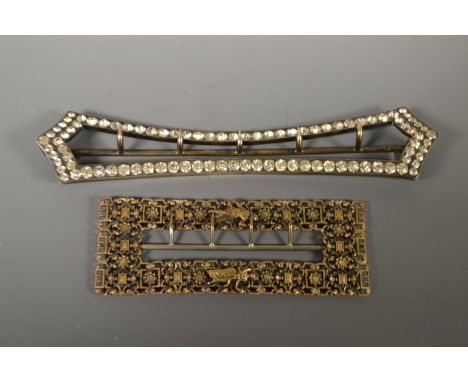 A Victorian white metal and paste arched Sash Buckle; a neoclassical belt buckle (2)  
