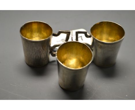 Three Russian silver vodka cups all fully marked.