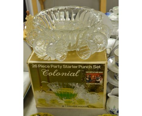 A 20th century dressed glass punch bowl and ten handled dipping cups, boxed