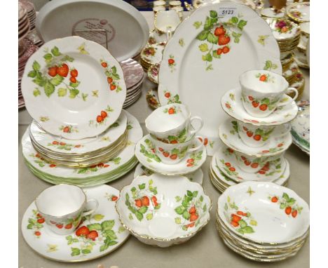 A Queen's Pottery Rosina china Virginia Strawberry pattern dinner and tea service, including oval meat plate, dinner plates, 