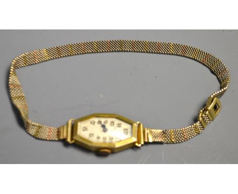 An Art Deco lady's Marksman cocktail watch, shaped dial, Arabic numerals, manual movement, 9ct gold chain link bracelet, 15.6