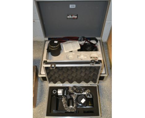 Photography - a Canomatica camera outfit, cased; an Akita camera outfit, cased; a Chinon Auto lens