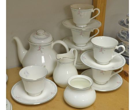 A Royal Doulton Carnation pattern tea service for six, printed marks, inc teapot, milk jug etc