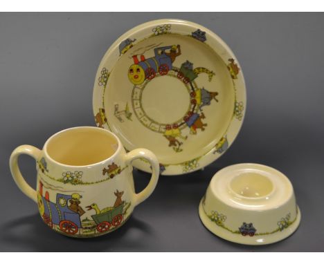 A Sylvac nursery set, comprising bowl, mug and egg cup 