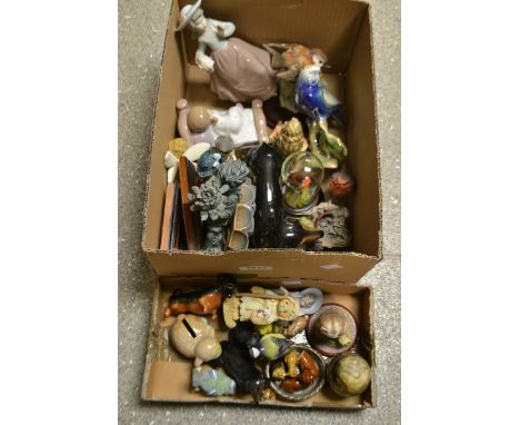 A pair of Beswick Daschund, a contintental pincushion doll, a Beswick Blue Tit, Nao models of children, Wade Whimsies, owl mo