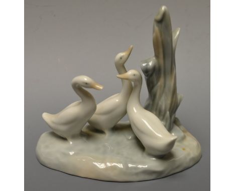 A Lladro model group of three geese