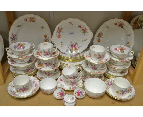 A set of seven Royal Crown Derby Posie pattern dinner plates, a pair of graduated oval serving platers, soup dishes, fruit bo