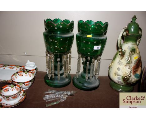 A pair of Victorian green glass and enamel decorated lustre vases