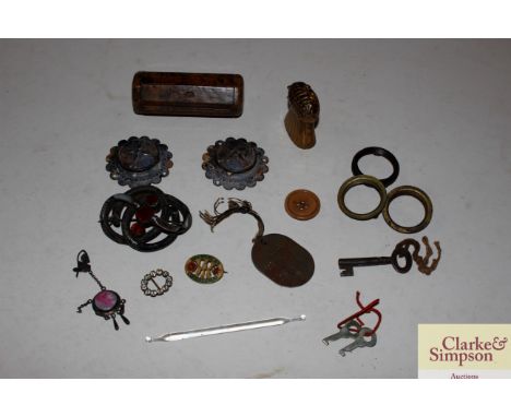 A brass thistle shaped vesta; a burr wood snuff box; a Victorian dress brooch; various badges etc. 