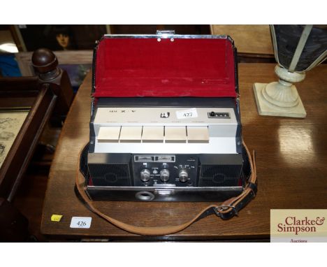 An Akai tape recorder in carrying case