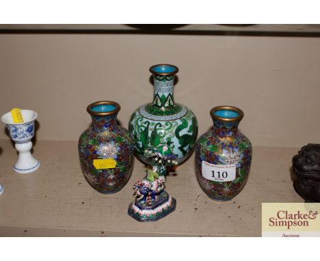 A pair of cloisonné baluster vases; a larger similar; and a small Indian enamel figure riding an elephant 