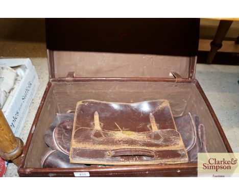 A vintage leather suitcase, an attaché case etc