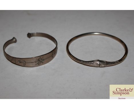 Two vintage white metal bangles