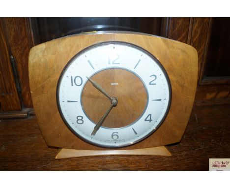 A Smiths walnut cased mantel clock 