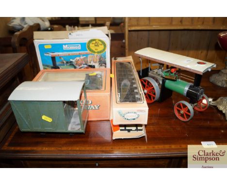 A Mamod model traction engine; a Mamod steam train; track and goods van 