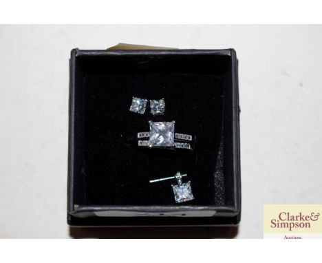 A Diamonique Sterling silver and Cubic Zirconia ring set, matching ear-rings and pendant