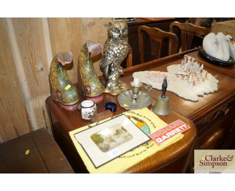 A pair of fish bookends; a gilded owl ornament; a small Satsuma pot; a plated chamber stick; bell etc. 