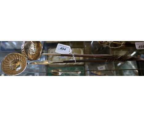 A George III hallmarked silver toddy ladle with whale bone turned handle having repousse decorated bowl, possibly made by Wal