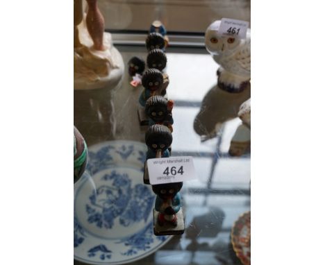 A mixed lot of assorted Robertsons Golly items to include an enamel pin badge depicting a tennis player made by H W Miller, e