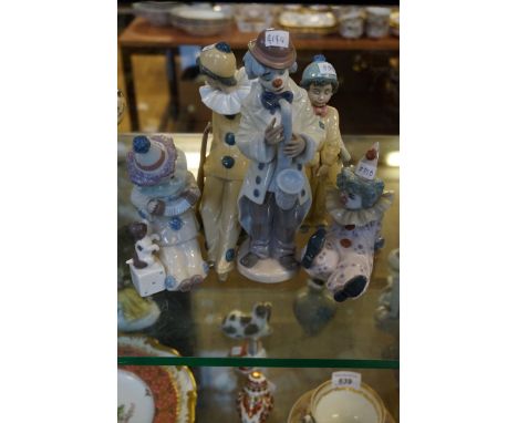 A collection of five Lladro Clown figurines.