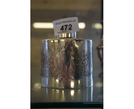 A Birmingham hallmark silver tea caddy of oval form having chased floral decoration, approx. weight 3.1oz.