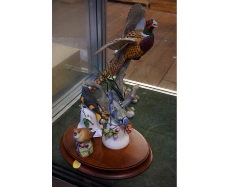 A mixed group of ceramic items to include a Franklin Mint ringed necked pheasant model by A.J Rudisill, together with three f