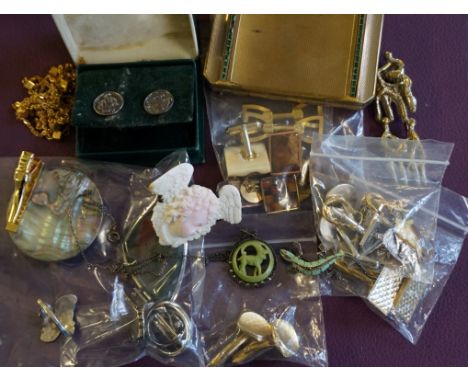 A collection of costume jewellery, to include; several pairs of silver and costume cufflinks, a gold coloured and green paste