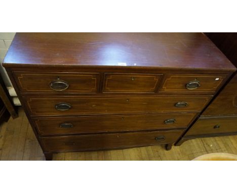 A Victorian inlaid mahogany straight front chest of six drawers, raised on bracket supports.