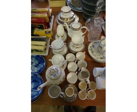 A Paragon Sandringham pattern tea service together with an Indian Tree pattern tea service.