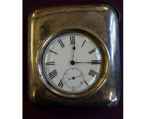 A silver pocket watch in silver fronted stand, with a white enamel face and secondary dial
