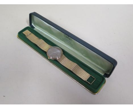 A 9ct yellow gold Rolex Geneve manual wind gents bracelet wristwatch, with a grey dial, 31mm wide not including button, brace