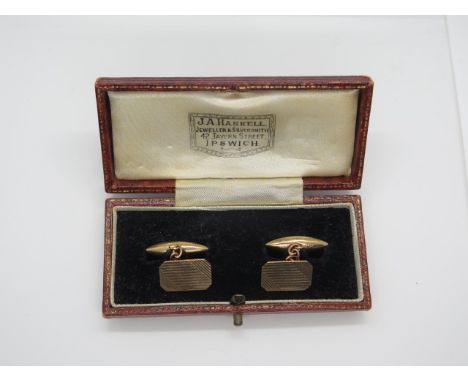 A pair of hallmarked 9ct gold cufflinks in original leather case, weight approx 4.2 grams, condition - usage marks and wear 