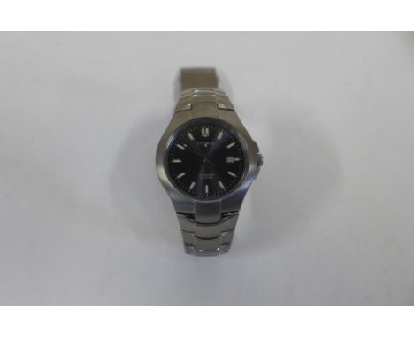 A gents Citizen Titanium W R 10 Bar Quartz wrist watch, virtually unworn condition, requires new battery 